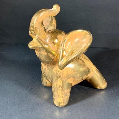 LOT:197: Stangl Humpty Dumpty Children's Plate, Stangle Gold-tone Elephant and Bud-vase, Silverplated Picture Frames and More