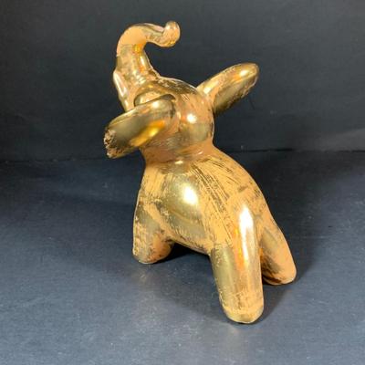 LOT:197: Stangl Humpty Dumpty Children's Plate, Stangle Gold-tone Elephant and Bud-vase, Silverplated Picture Frames and More