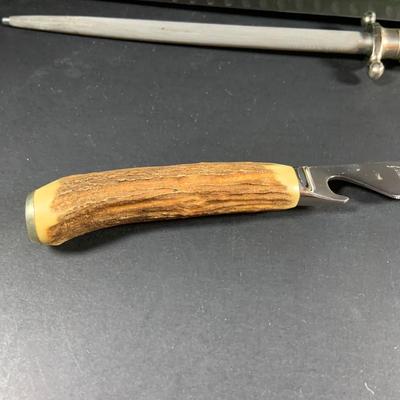 LOT:202: Assortment of Knives, Cleaver, and Carving Tools Featuring Connoisseur Slicer Knives, Remington Cleaver and More