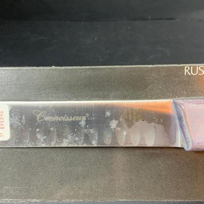 LOT:202: Assortment of Knives, Cleaver, and Carving Tools Featuring Connoisseur Slicer Knives, Remington Cleaver and More