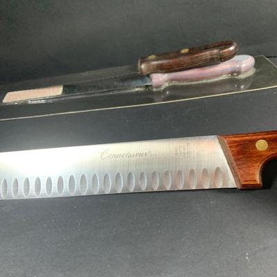 LOT:202: Assortment of Knives, Cleaver, and Carving Tools Featuring Connoisseur Slicer Knives, Remington Cleaver and More