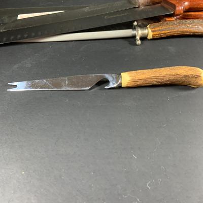 LOT:202: Assortment of Knives, Cleaver, and Carving Tools Featuring Connoisseur Slicer Knives, Remington Cleaver and More