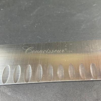 LOT:202: Assortment of Knives, Cleaver, and Carving Tools Featuring Connoisseur Slicer Knives, Remington Cleaver and More