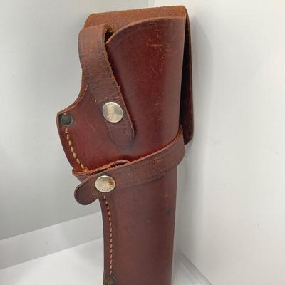 LOT 249: Three Leather Firearm Holders / Holsters, Doskocil Gun Case and Cleaning / Care Supplies (Outers Case) and More
