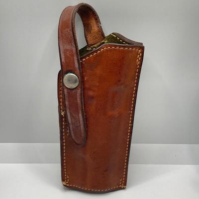 LOT 249: Three Leather Firearm Holders / Holsters, Doskocil Gun Case and Cleaning / Care Supplies (Outers Case) and More