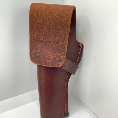 LOT 249: Three Leather Firearm Holders / Holsters, Doskocil Gun Case and Cleaning / Care Supplies (Outers Case) and More