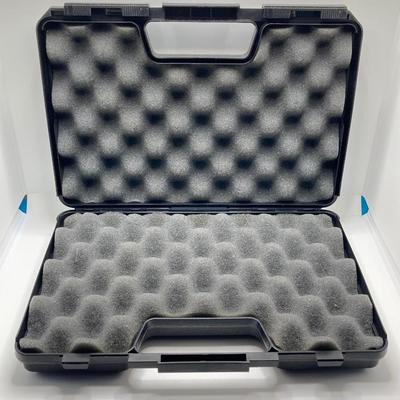 LOT 249: Three Leather Firearm Holders / Holsters, Doskocil Gun Case and Cleaning / Care Supplies (Outers Case) and More