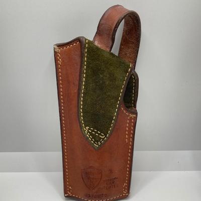 LOT 249: Three Leather Firearm Holders / Holsters, Doskocil Gun Case and Cleaning / Care Supplies (Outers Case) and More