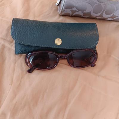 COACH WALLET AND ZIPPERED BAG ALSO A PAIR OF SUNGLASSES