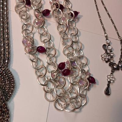 3 NECKLACES AND A BROOCH
