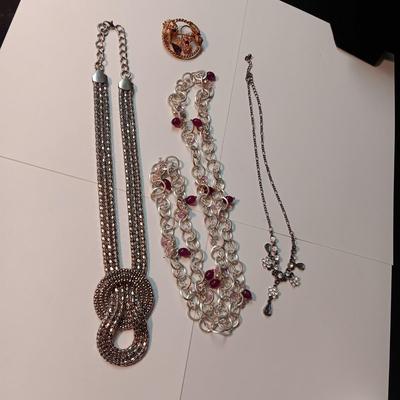 3 NECKLACES AND A BROOCH