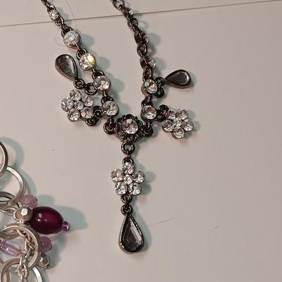 3 NECKLACES AND A BROOCH