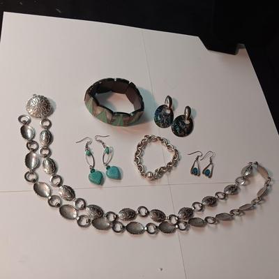 CONCHO BELT, BRACELETS AND EARRINGS