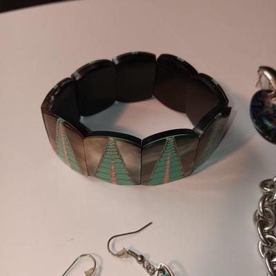 CONCHO BELT, BRACELETS AND EARRINGS