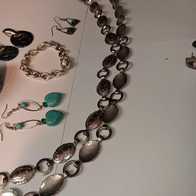 CONCHO BELT, BRACELETS AND EARRINGS