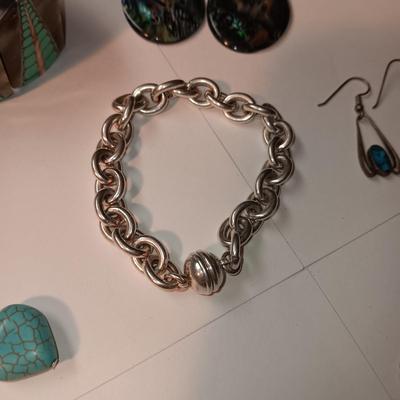 CONCHO BELT, BRACELETS AND EARRINGS