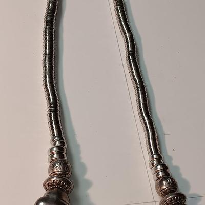 CHARM BRACELET AND AN ASSORTMENT OF SILVER-TONE JEWELRY