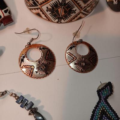 EARRINGS, BRACELETS AND A WATCH