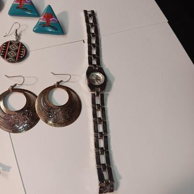 EARRINGS, BRACELETS AND A WATCH