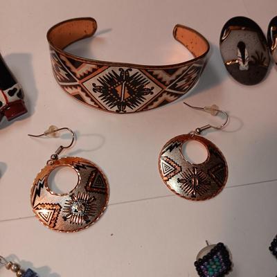 EARRINGS, BRACELETS AND A WATCH