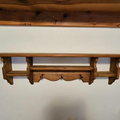 Two wooden wall shelves