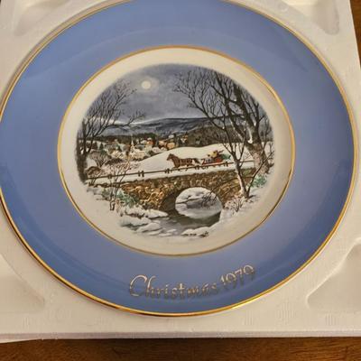 Collectible Avon plate " Dashing through the snow" with musical swan and a clay Guardian Angel