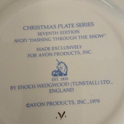 Collectible Avon plate " Dashing through the snow" with musical swan and a clay Guardian Angel