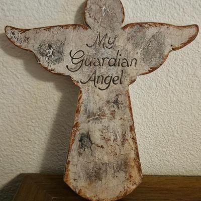 Collectible Avon plate " Dashing through the snow" with musical swan and a clay Guardian Angel