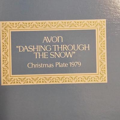 Collectible Avon plate " Dashing through the snow" with musical swan and a clay Guardian Angel