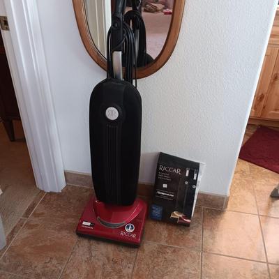 LIKE NEW RICCAR VACUUM WITH A BOX OF BAGS