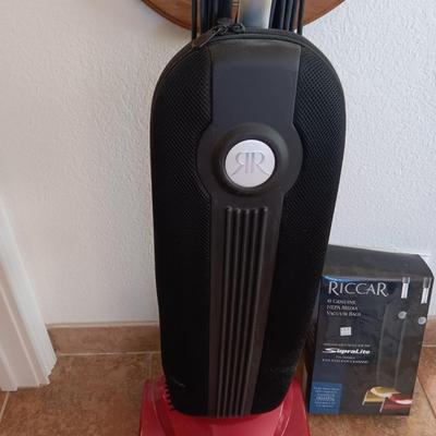LIKE NEW RICCAR VACUUM WITH A BOX OF BAGS