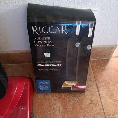 LIKE NEW RICCAR VACUUM WITH A BOX OF BAGS
