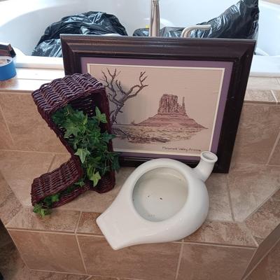 ANTIQUE PORCELAIN COMMODE, NEEDLEPOINT PICTURE AND WICKER BOOT
