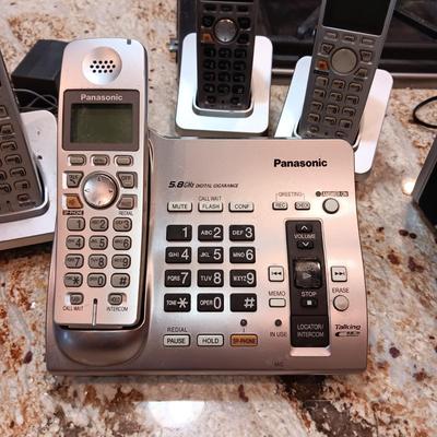 PANASONIC 4 HANDSET CORDLESS PHONES AND MIDLAND ELECTRIC OR HAND CRANK RADIO