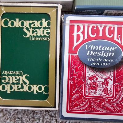 Decks of playing cards - cribbage game and a vintage travel backgammon game