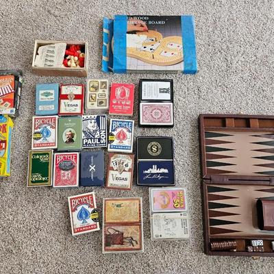 Decks of playing cards - cribbage game and a vintage travel backgammon game