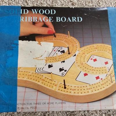 Decks of playing cards - cribbage game and a vintage travel backgammon game