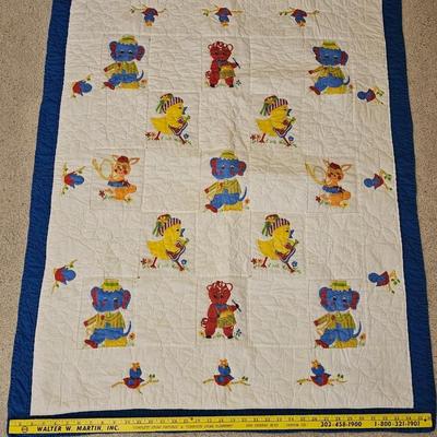 Quilted teddy bear with stand and two small baby blanket quilts
