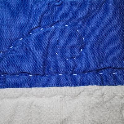 Quilted teddy bear with stand and two small baby blanket quilts