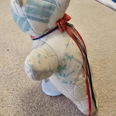 Quilted teddy bear with stand and two small baby blanket quilts