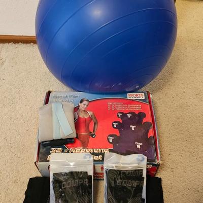 Yoga ball with pump, compression socks, and an exercise weight set