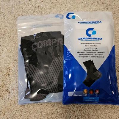 Yoga ball with pump, compression socks, and an exercise weight set