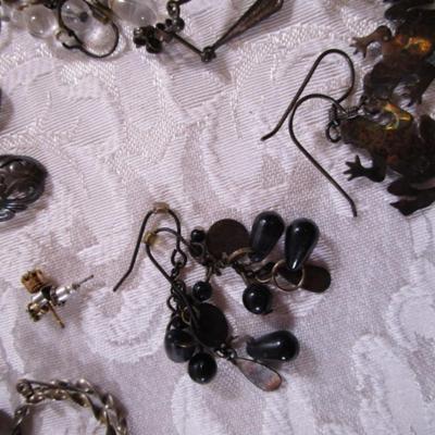 16 pair of pierced earrings