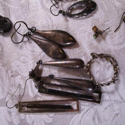 16 pair of pierced earrings