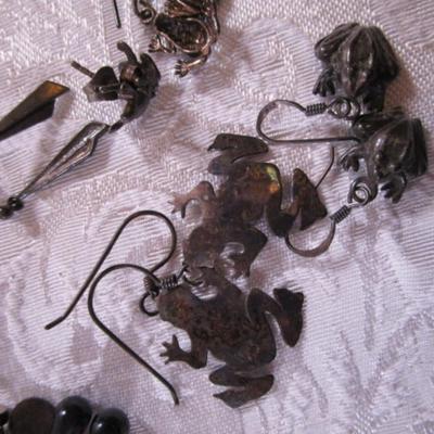 16 pair of pierced earrings