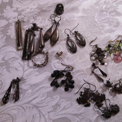 16 pair of pierced earrings