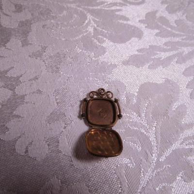 Vintage locket pendant by SKM Co. gold-tone