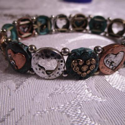 2 women's metal bracelets