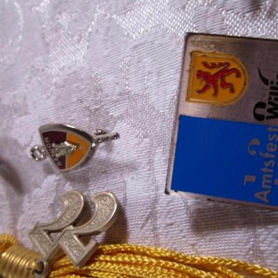 7 ID chains, 2 tassels, pins, cross, key chains