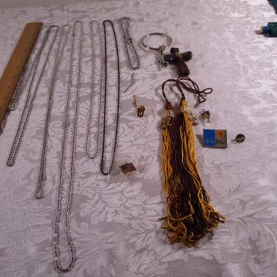 7 ID chains, 2 tassels, pins, cross, key chains